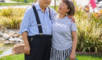 couple standing next to each other in assisted living