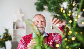 A senior man celebrates the holidays