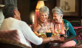 seniors enjoy a dinner party