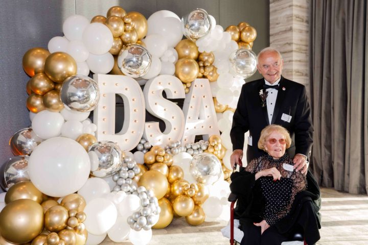 Generations staff stand in front of the DSA Balloons